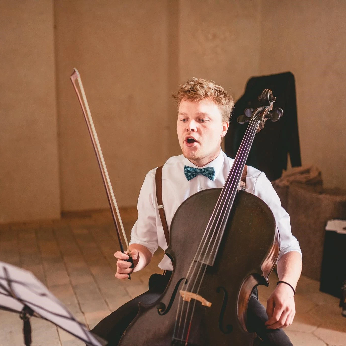 The Petr's crazy profile photo with violoncello.